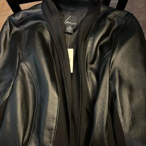 Brand new. Leather and accent jacket/blazer